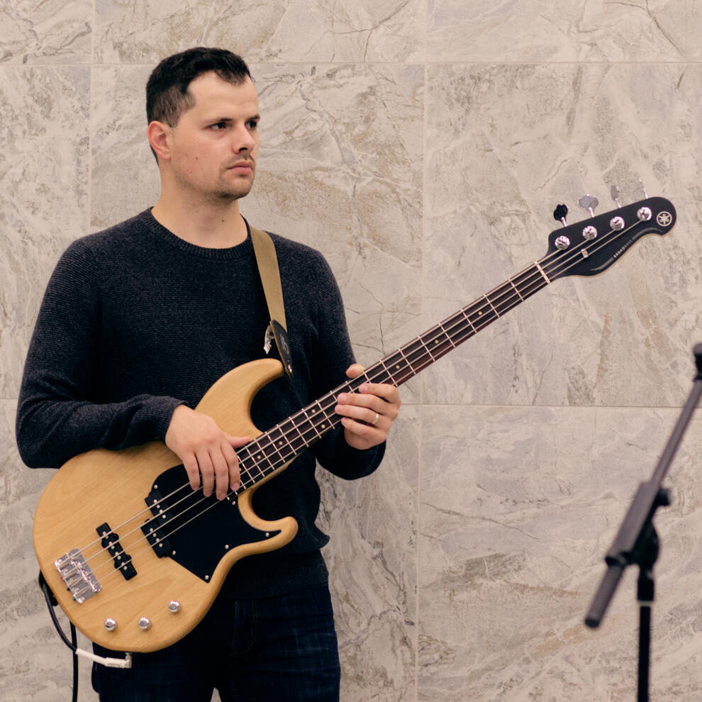 Playing bass guitar at our monthly Low German music night Playing bass guitar at our monthly Low German music night