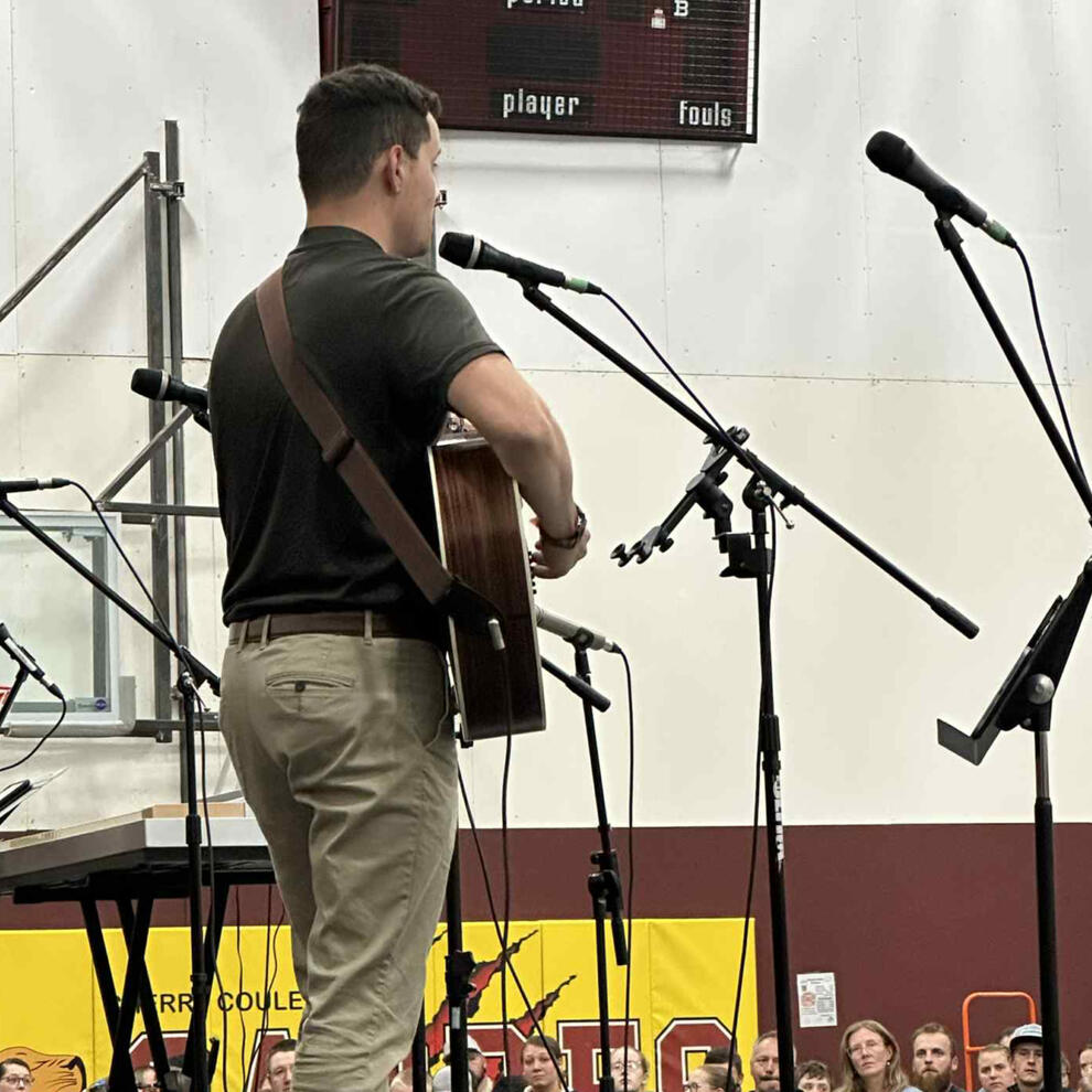 Backstage shot of me sharing one of my songs at an Alberta festival