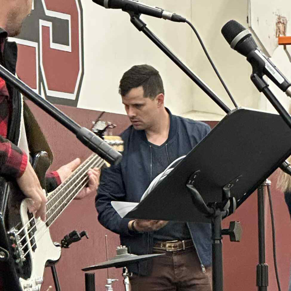 Me helping run the sound system for another group at a festival in Alberta
